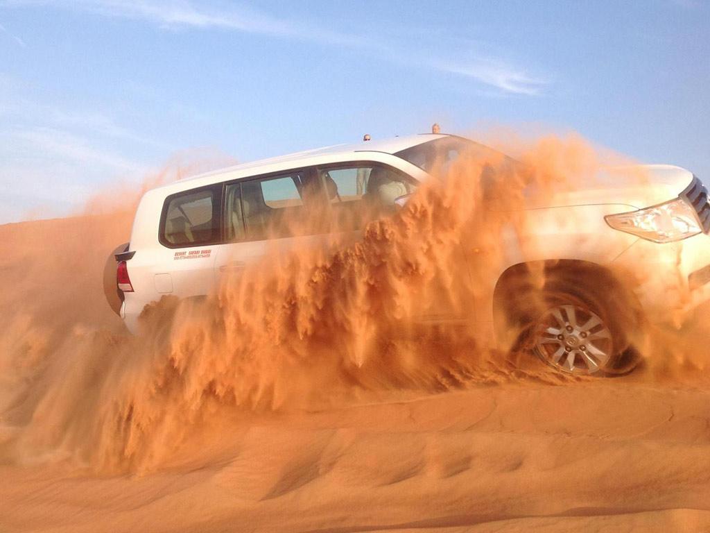 Arabian Desert Dunes Safari with Camel Ride and Dinner